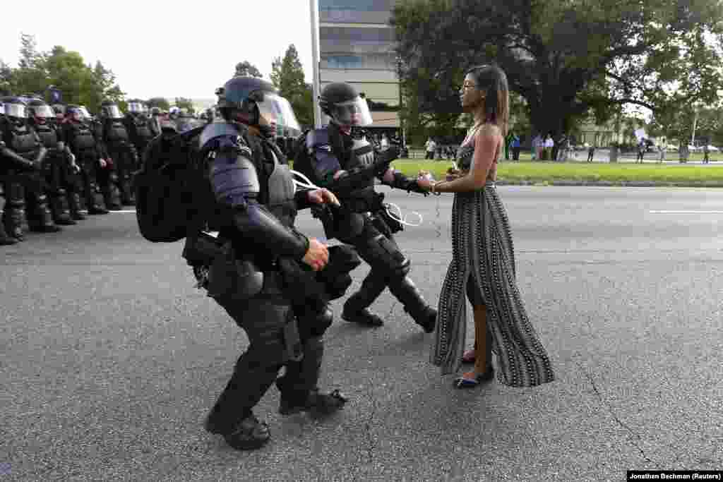Ieshia Evans became a symbol of the Black Lives Matter movement in the United States after her arrest during a protest in Baton Rouge. Reuters photographer Jonathan Bachman, who captured the moment, told a colleague that "I turned and looked over my right shoulder and saw this woman standing in the road. I knew right away what was about to happen. "I quickly moved and took the shot. When I came back to my car and looked through my take I knew I had a strong image," he was quoted as saying by the news agency. "However, I didn't anticipate that the image would go viral. I am grateful that it has stimulated a discussion about an important issue in this country."