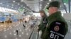 Оьрсийчоь -- Эскаран полицин эпсарш бу Сочин кIоштахь Адлерера вокзалехь. Дечк17, 2014