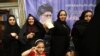 Iranian women cast their ballots for the presidential election at a polling station in southern Tehran on May 9. 