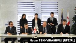 ჯონ ბასი, ზურაბ ადეიშვილი, სტივენ ჰეიკინი, გიგი უგულავა