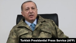 رجب طیب اردوغان؛ ۲۵ ژانویه در دیدار از پایگاه مرکزی عملیات موسوم به «شاخه زیتون»