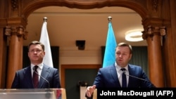Ministrul rus al energiei Aleksander Novak și omologul ucrainean Oleksiy Orzhel la conferința de presă de la Berlin, 19 decembrie 2019.