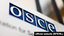 Emblema OSCE.