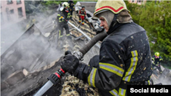 Kharkiv firefighters worked to put out blazes sparked by a Russian drone attack overnight on May 5-6.