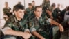Nagorno-Karabakh - General Vitali Balasanian (L) and other senior officers watch military exercises.