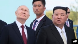 Владимир Путин и Ким Џонг Ун