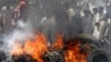 Protesters burn tires in Quetta on August 28