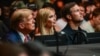 Fostul președinte al SUA Donald Trump (stânga), fiica sa Ivanka Trump (centru) și soțul ei, Jared Kushner, participă la un eveniment de arte marțiale mixte la Centrul Kaseya din Miami, Florida, pe 9 martie.