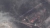 A satellite image shows a long traffic jam of vehicles along the Lachin corridor as ethnic Armenians flee from Nagorno-Karabakh, September 26, 2023. 