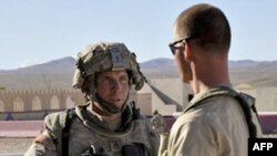 Staff Sgt. Robert Bales (left) is accused of killing 17 people on a shooting rampage on March 11.
