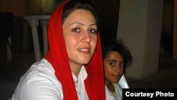 Maryam Akbari Monfared and her daughter in an undated photo.