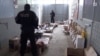 Armenia - A screenshot of official video of security officers finding large stockpiles of food in a villa belonging to retired General Manvel Grigorian, 17 June 2018.