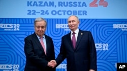 BMG-niň Baş sekretary Antonio Guterriş Russiýanyň prezidenti Wladimir Putin bilen görüşýär.