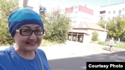 Айгүл Өтепова.