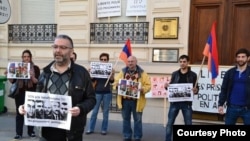 France - French-Armenian activist Schanth Vosgueritchian leads a protest outside the Armenian Embass in Paris, 28April 2015.